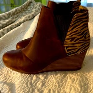 Brown wedge boots tiger print on back